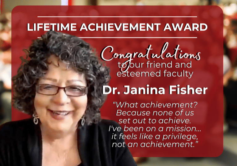 Janina Fisher lifetime achievement award red background white letters glasses dark curly hair